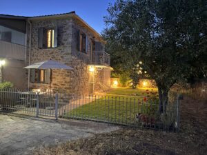 Messinian Stone House - House and garden night view